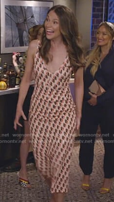 Liza's orange printed midi dress on Younger