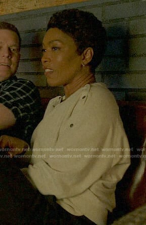 Athena's buttoned sweater on 9-1-1