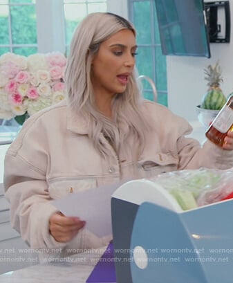 Kim's white denim jacket on Keeping Up with the Kardashians