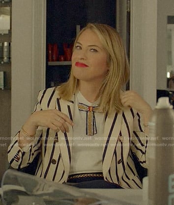 Coco's striped blazer and bow top on American Horror Story