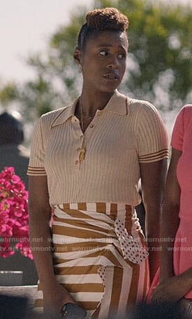 Issa's polo top and striped skirt on Insecure