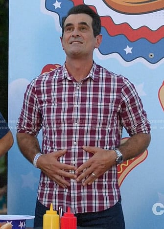 Phil's red plaid shirt on Modern Family