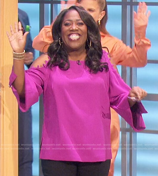 Sheryl's purple button sleeve cold shoulder top on The Talk