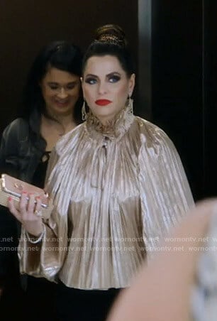 D'Andra's metallic pleated top and tassel pants on The Real Housewives of Dallas