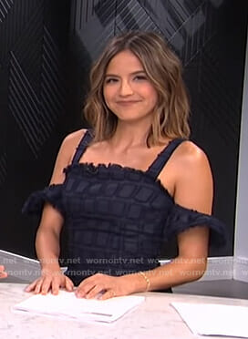 Erin's navy cold-shoulder dress on E! News