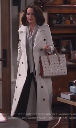 Karen's white double breasted trench coat on Will and Grace