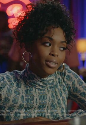 Anissa's beetle print blouse on Black Lightning