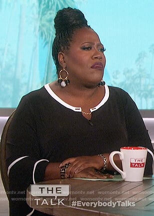 Sheryl's black contrast bell sleeve top on The Talk