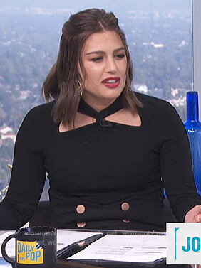 Carissa's black twist neck cutout sweater on E! News Daily Pop