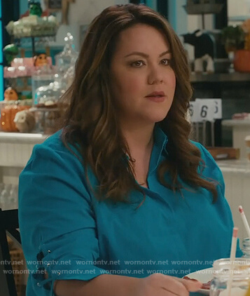 Katie's turquoise lace-up sleeve blouse on American Housewife