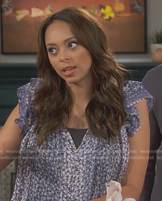 Claire's blue floral tassel top on Happy Together