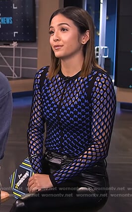 Erin's black and blue knit top on E! News
