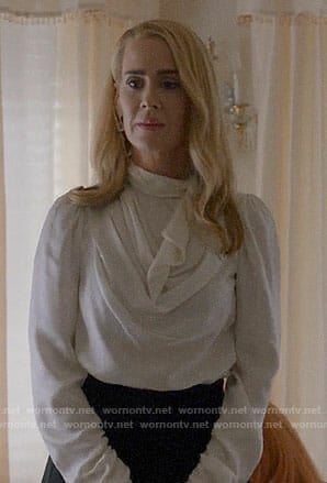 Cordelia's white cowl neck blouse on American Horror Story Apocalypse