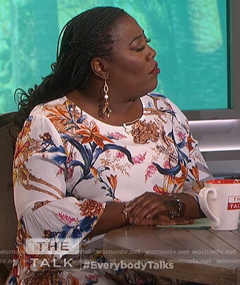 Sheryl's white floral print bell sleeve top on The Talk