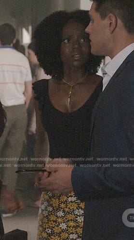 Josie's daisy skirt and black top on Riverdale