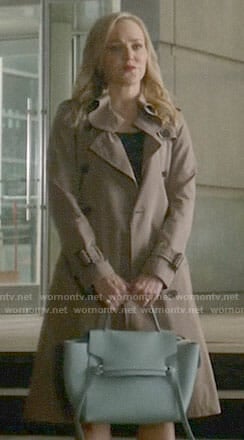 Marissa's trench coat and blue bag on Bull