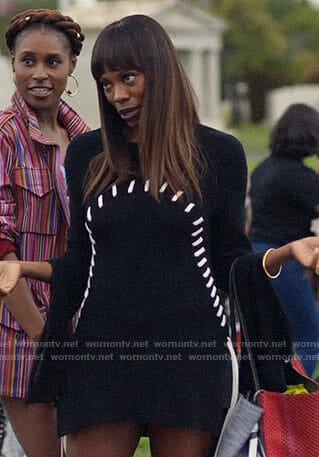 Molly's black sweater dress with white stitching on Insecure