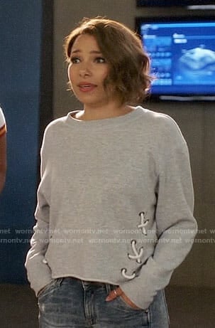 Nora's grey lace-up sweatshirt on The Flash