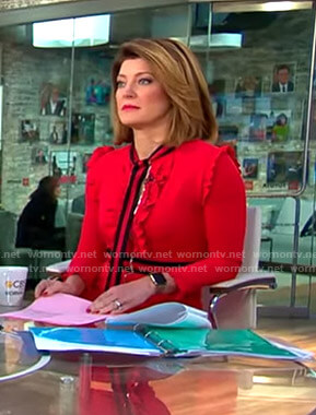 Norah's red ruffled tie neck dress on CBS This Morning