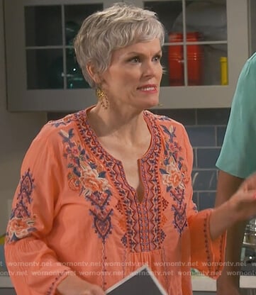Bonnie's orange floral embroidered top on Happy Together