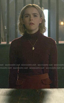 Sabrina's burgundy turtleneck and brown skirt on Chilling Adventures of Sabrina