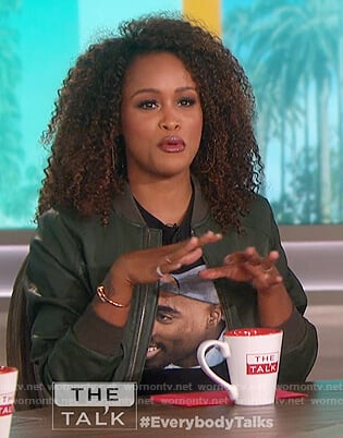 Eve's green leather bomber jacket and Tupac tee on The Talk