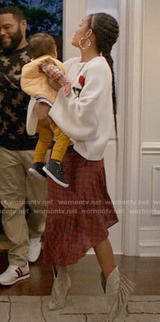 Zoey's red plaid skirt and oui heart sweater on Black-ish