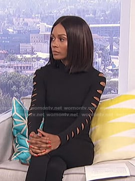 Zuri's black cutout sleeve top on Live from E!