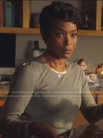 Athena's grey top with metallic trim on 9-1-1