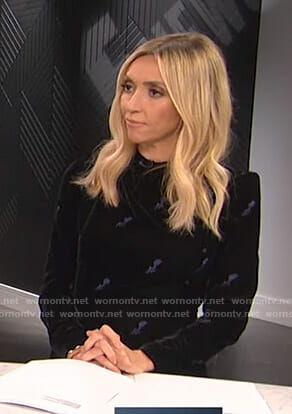 Giuliana's black velvet mini dress on E! News
