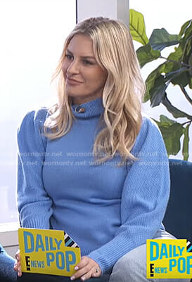 Morgan's blue puff sleeve turtleneck sweater on E! News Daily Pop