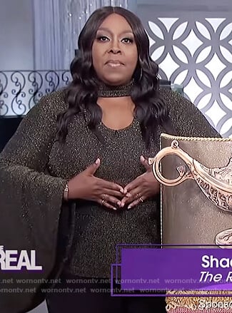 Loni's black metallic bell sleeve top on The Real