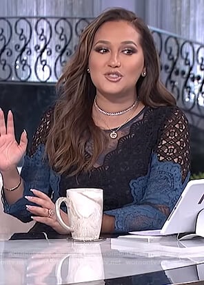 Adrienne's black and blue lace dress on The Real