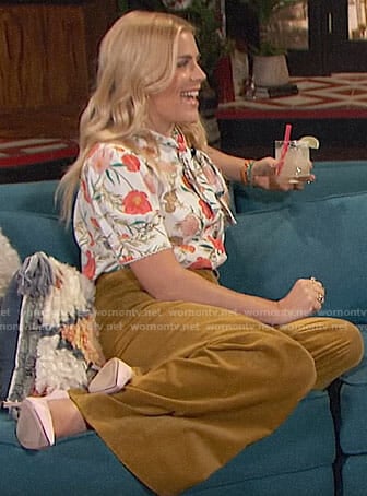 Busy's floral tie-neck blouse and wide leg pants on Busy Tonight