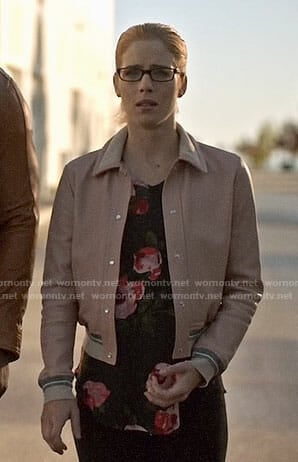 Felicity's floral top and pink bomber jacket on Arrow