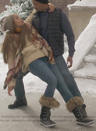 Clair's black lace up boots with fur trim on Happy Together