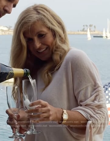 Debra's pink lace-up sleeve sweater on Dirty John