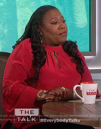 Sheryl's red keyhole bell sleeve top on The Talk