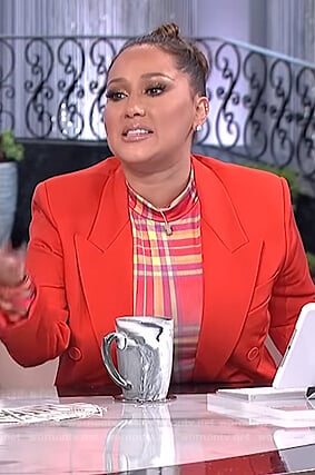 Adrienne's plaid mock neck top and red blazer on The Real