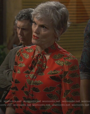 Bonny's red leopard lip print top on Happy Together