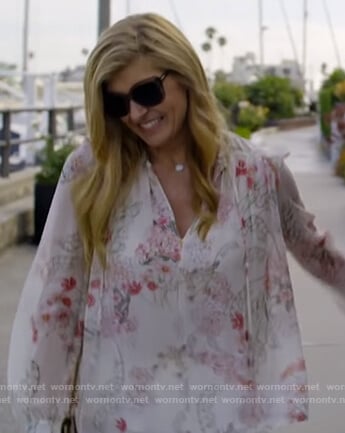 Debra's white floral tie neck blouse on Dirty John