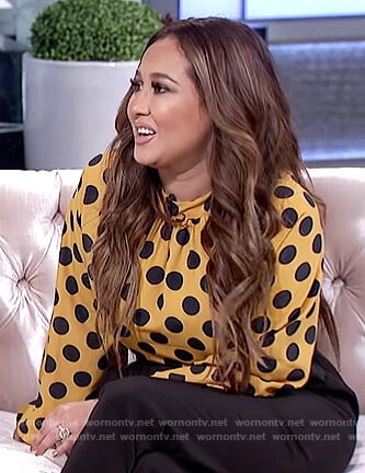 Adrienne's yellow polka dot top on The Real