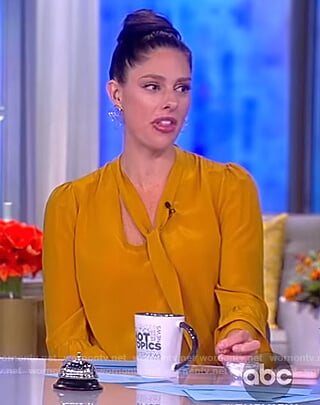 Abby's yellow tie neck blouse on The View