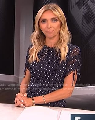 Giuliana's navy polka dot ruffled dress on E! News
