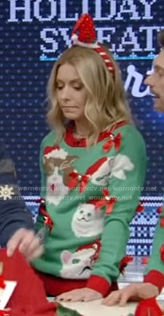 Kelly's green cat print ugly christmas sweater on Live with Kelly and Ryan