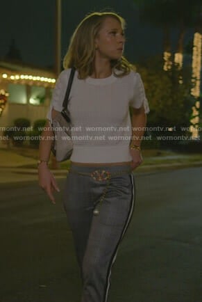 Veronica's white lace-up sleeve top and plaid pants on Dirty John