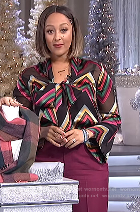 Tamera's black striped sheer blouse on The Real