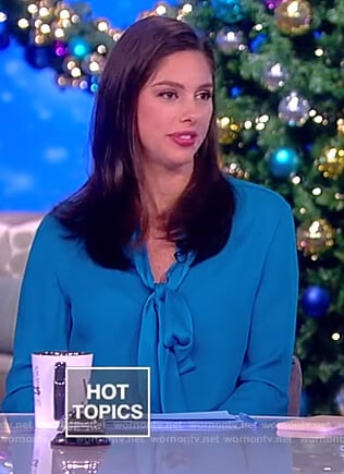 Abby's blue tie neck blouse on The View