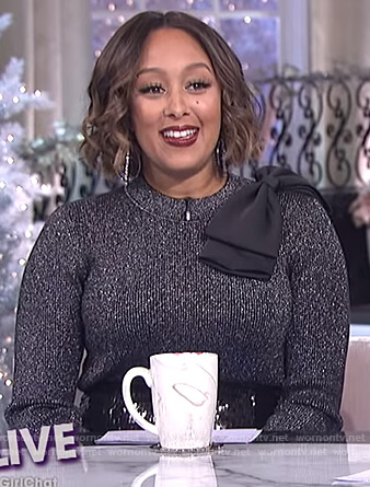 Tamera's black metallic bow shoulder sweater on The Real