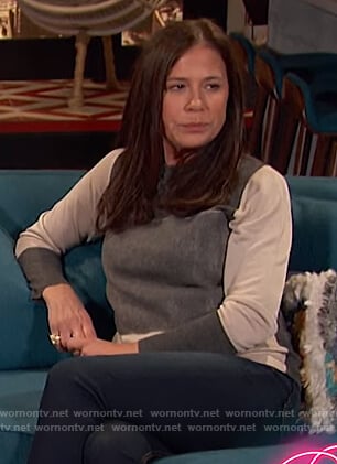 Maura Tierney's colorblock sweater on Busy Tonight